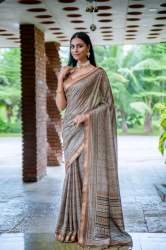 Beautiful Light Grey Traditional Print Fancy Pallu Tussar Silk Saree