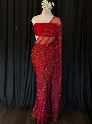 Crystal organza shaded Berry Red Saree by Fatiz Garments And Events Pvt Ltd