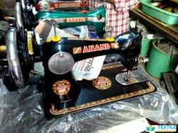 Anand Sewing Machine Co logo icon