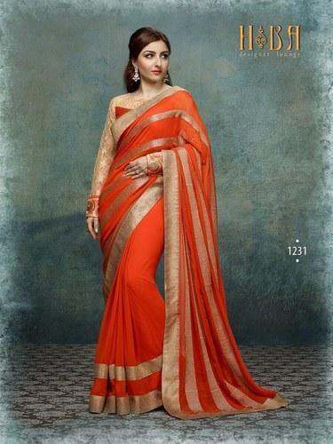 Orange color party wear saree by Shiv Priya Sarees