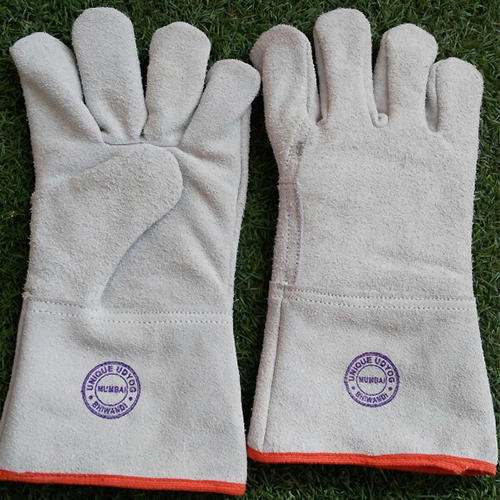 Natural leather hand gloves by Unique Udyog Mumbai
