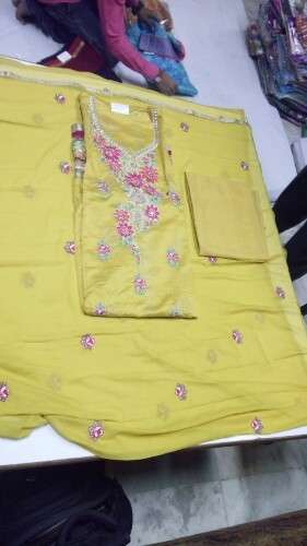 Embroidery dress material by Naresh Textiles
