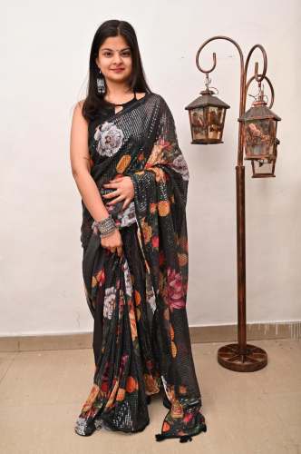 black saree with georgette fabric with digital print readymade and stitched blouse 