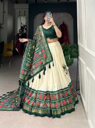 Newly And Classical Wedding Grace  In Patola Print With Tussar Silk Lehenga