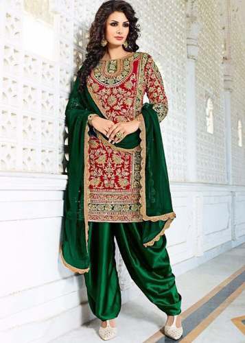 heavy work bridal suit by Sonica Sarees