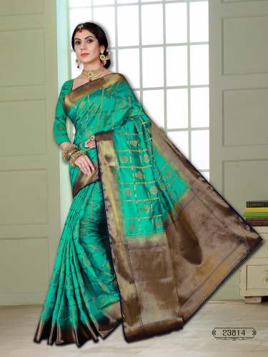 Turquoise Green colored Banarasi silk saree.