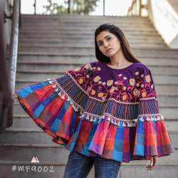 print with embroidered poncho