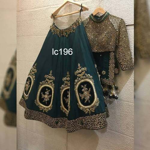 Green Color Tapeta Silk Lehenga Choli.
