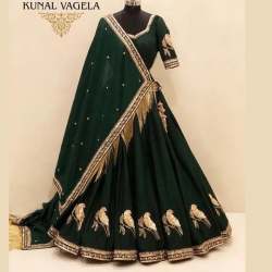 Green Embroidered Attractive Party Lehenga Cholli.