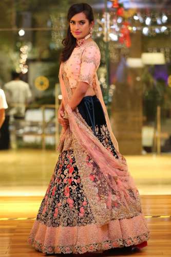 Peach And Blue Colored Embroidered Lehenga Choli.