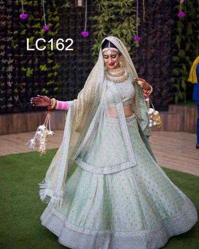 White Color Attractive Designer Lehenge Choli.