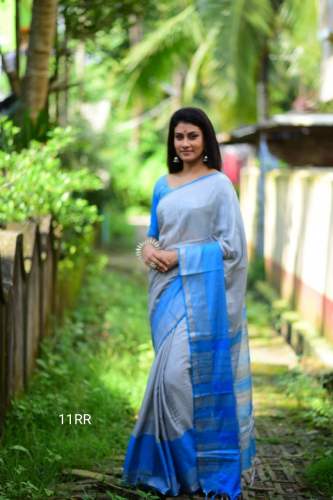 Linen cotton saree with silver zari woven border  by Clemira