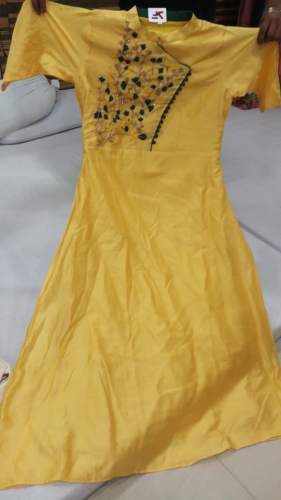 Yellow embroidered Rayon Kurtis