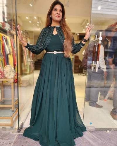 DESIGNER AND FANCY FLAUNT GOWN