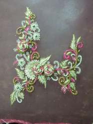 Designer gown design in hand embroidery 