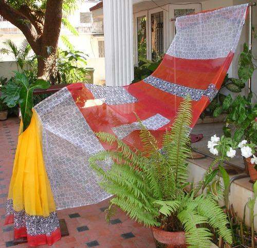 Red And White Supernet Saree by Sunbright Textiles India Pvt Ltd