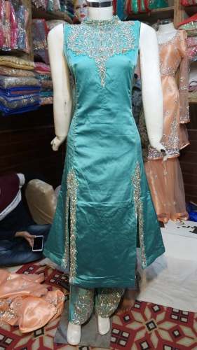 Party wear salwar suit  by MEXPORT FASHION