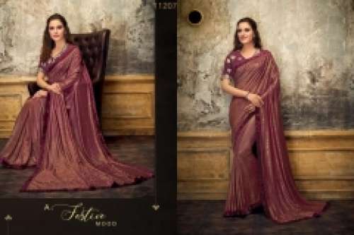 Embossed lycra saree by Vintage Collection