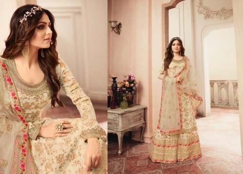 R HEAVY JACQUARD SALWAR SUITS  by Om Creation