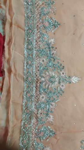 Hand embroidery suits by Global Impex Agency