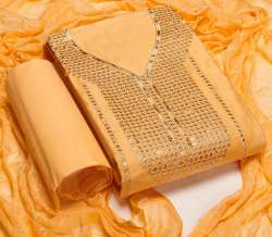 Dress material with light golden work 