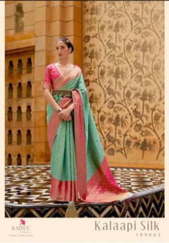 Latest Fancy Designer green color woven soft silk saree by Agarwal Creation Fashions Private Limited