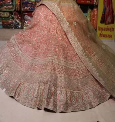 Pink Net Embroidery Lehenga Choli by Premi Saree Center