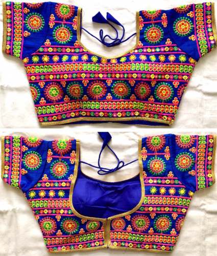 Blouse has thread work and foil mirror work 