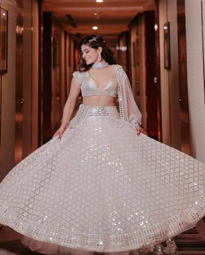 gorgeous in this beautiful off white lehenga set 