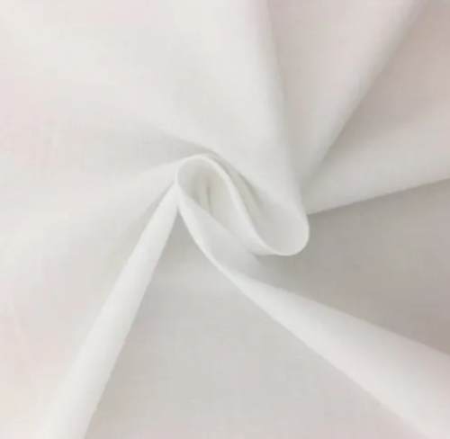 Plain White Cotton Fabric by Cotton Haven Apparels