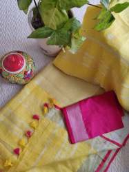 Linen Embroidered Saree with Tassels Detailing and Hot Pink Blouse