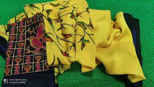 Stylish yellow Satin Chiffon saree by Shanties Collections
