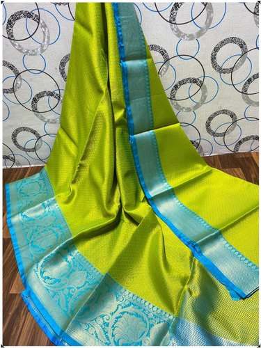 Fancy Banarasi Kora Muslin Saree by Magnus Trading