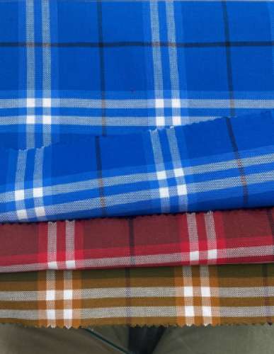 Blue color checks shirting fabric by Lata Traders