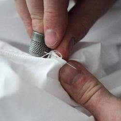 Amra Shirts Fabricators logo icon