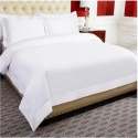 white-bed-sheet