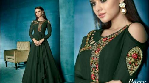 Dark Green Shoulder Cut Ladies Gown  by Harshada Ladies Wear And Born Baby Shop