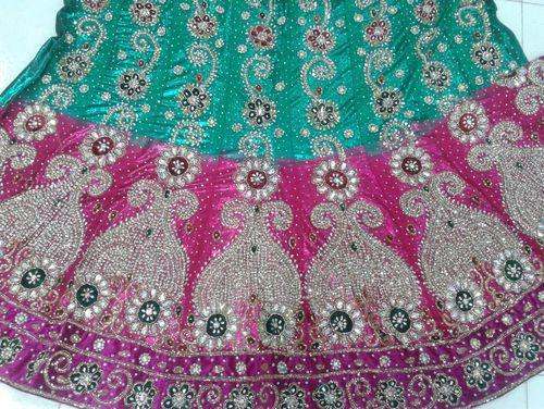 Green And Pink Heavy Zardoshi Work Lehenga  by Kala Niketan