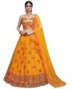 mustard-thread-embroidered-net-bridal-lehenga