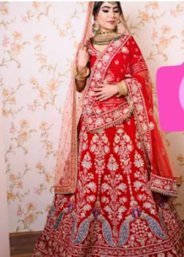 Ladies Red Wedding Lehnega by Pangghat Fashion