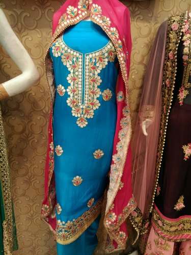 Ladies Embroidered Dress Material by Armaan Wedding Mall