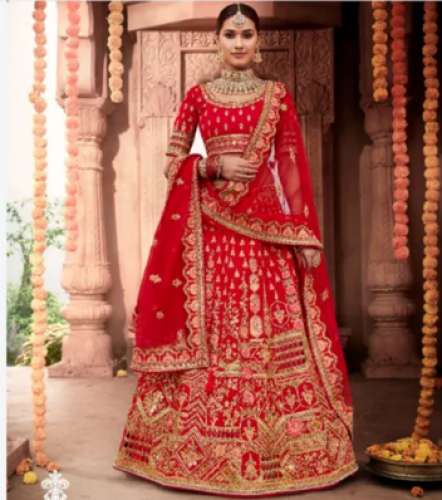 Red Wedding Lehenga  by Pooja Sarees