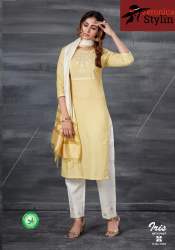 Iris COTTON WITH EMBROIDERY WORK AND OTHER TRIMS.