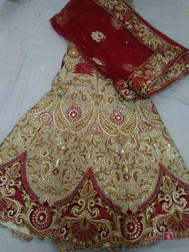 Ladies Bridal Lehenga by Dev Textiles