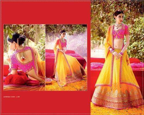 Yellow With Pink Lehenga by Brijraj Fashion Pvt Ltd