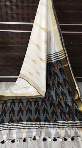 Casual Wear Black and Off white Ikkat Saree  by Shree Jeen Mata Fabrics