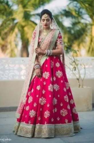 Bridal Wear Pink Embroidered Lehenga Choli  by Nikita Bhushan