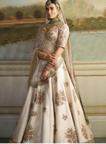 Elegant Off White Bridal Lehenga  by Nikita Bhushan