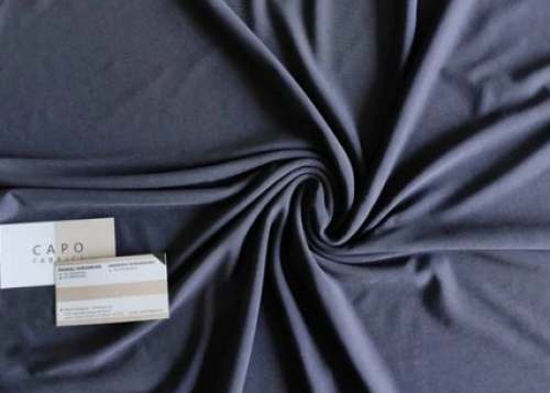 Plain Dyeable Four Way Lycra Fabric  by Capo Fabrics