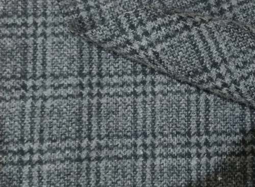 Woolen tweed fabric by New India Trends